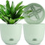 A 3-pack of 10-inch self-watering pots in various colors (white, black, green), suitable for indoor plants and flowers.
