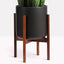Elevate Your Space: 12" Black Ceramic Planter with Stylish Wood Stand Set