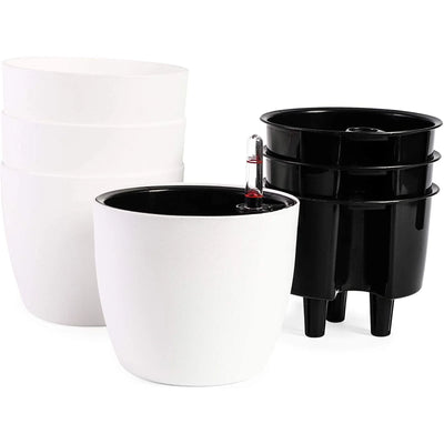 A 4-pack of white self-watering planters with a black inner basket, showcasing the water level indicator.